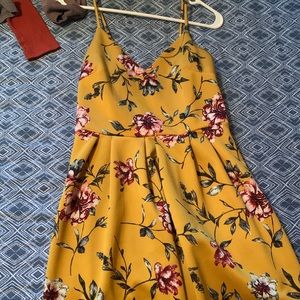 knee length yellow dress.